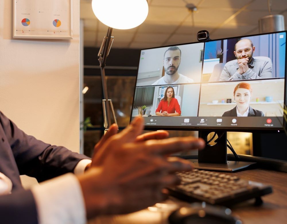 entrepreneur-discussing-financial-statistics-with-remote-team-online-videocall-meeting-conference-diverse-corporate-employees-working-overhours-company-growth-report-startup-office